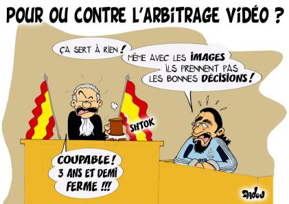 http://www.foot-land.com/caricatures/reduites/Arbitrage-Video-08-12-2008.jpg